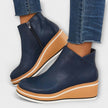 Samira – Botins de cunha com acabamento luminoso