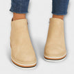 Samira – Botins de cunha com acabamento luminoso