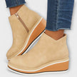 Samira – Botins de cunha com acabamento luminoso