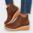 Samira – Botins de cunha com acabamento luminoso