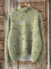 Cora — Camisola de gola subida com padrão floral