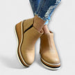 Samira – Botins de cunha com acabamento luminoso