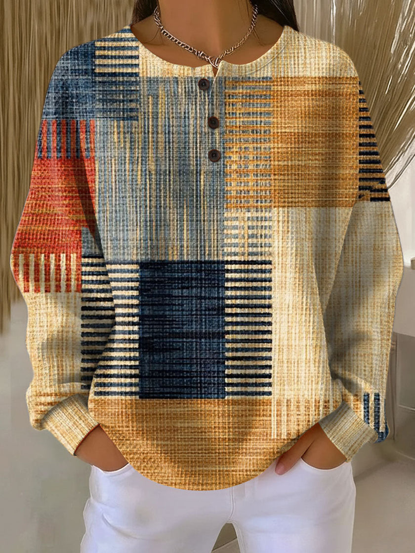 Lucia — Camisola texturada com botões